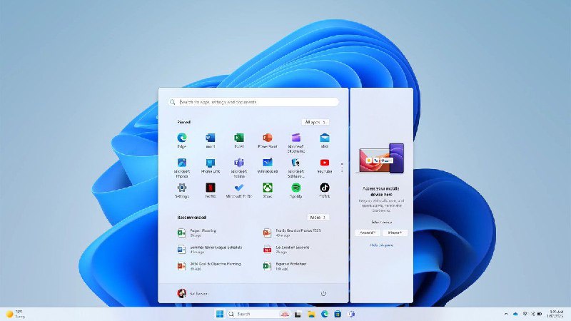 Windows 11开始菜单新增手机互联功能微软在Windows 11测试版中推出手机深度互联功能，用户可通过开始菜单直接绑定安卓或iPhone设备